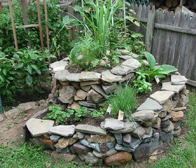 15 Reasons To Build An Herb Spiral For Your Permaculture Garden