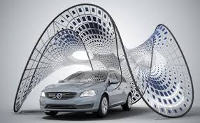 Collapsible solar pavilion charges Volvo V60, fits in its trunk